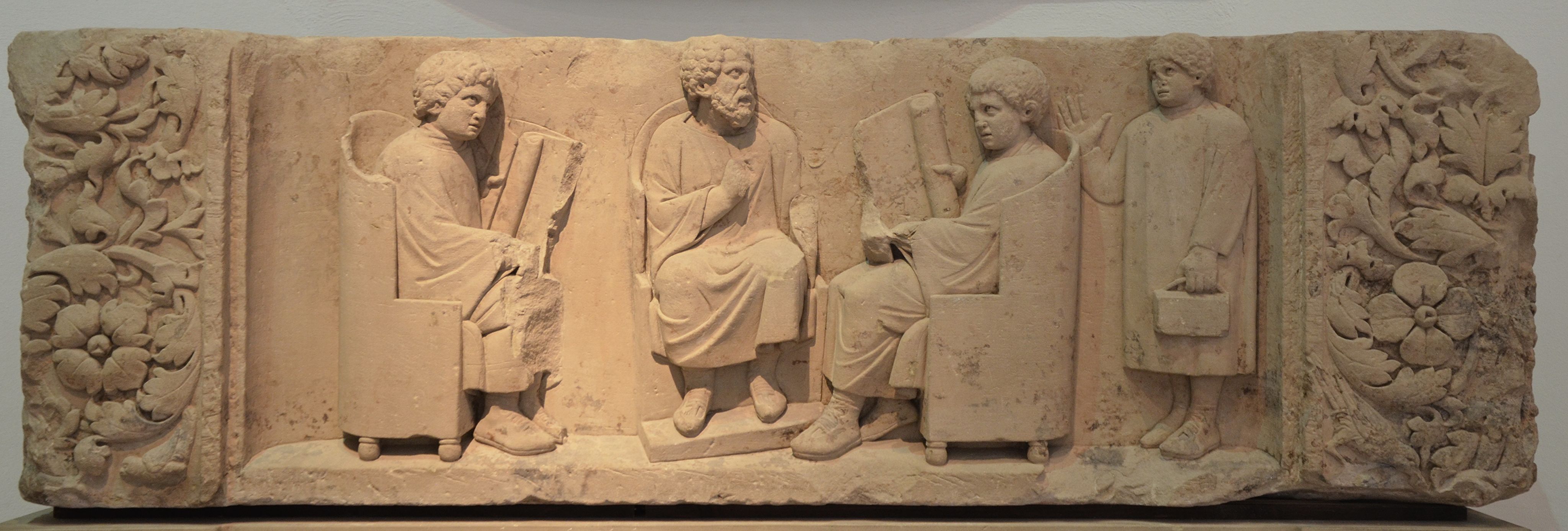 Carole Raddato from Frankfurt, Germany - Funerary relief found in Neumagen near Trier, a teacher with three discipuli, around 180-185 AD, Rheinisches Landesmuseum Trier, Germany