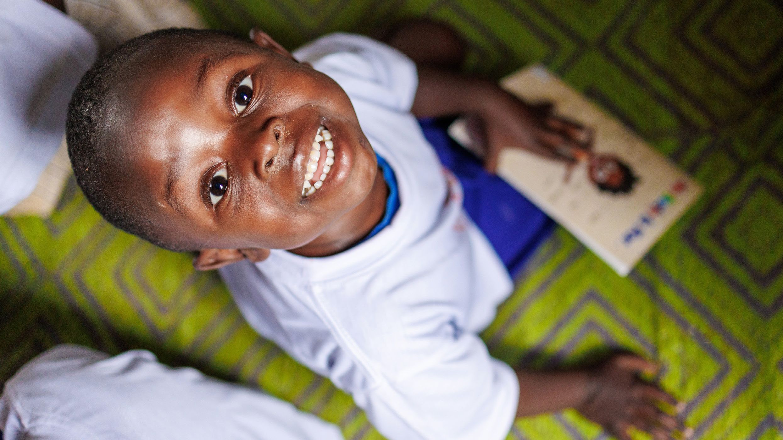Child looking up at camera