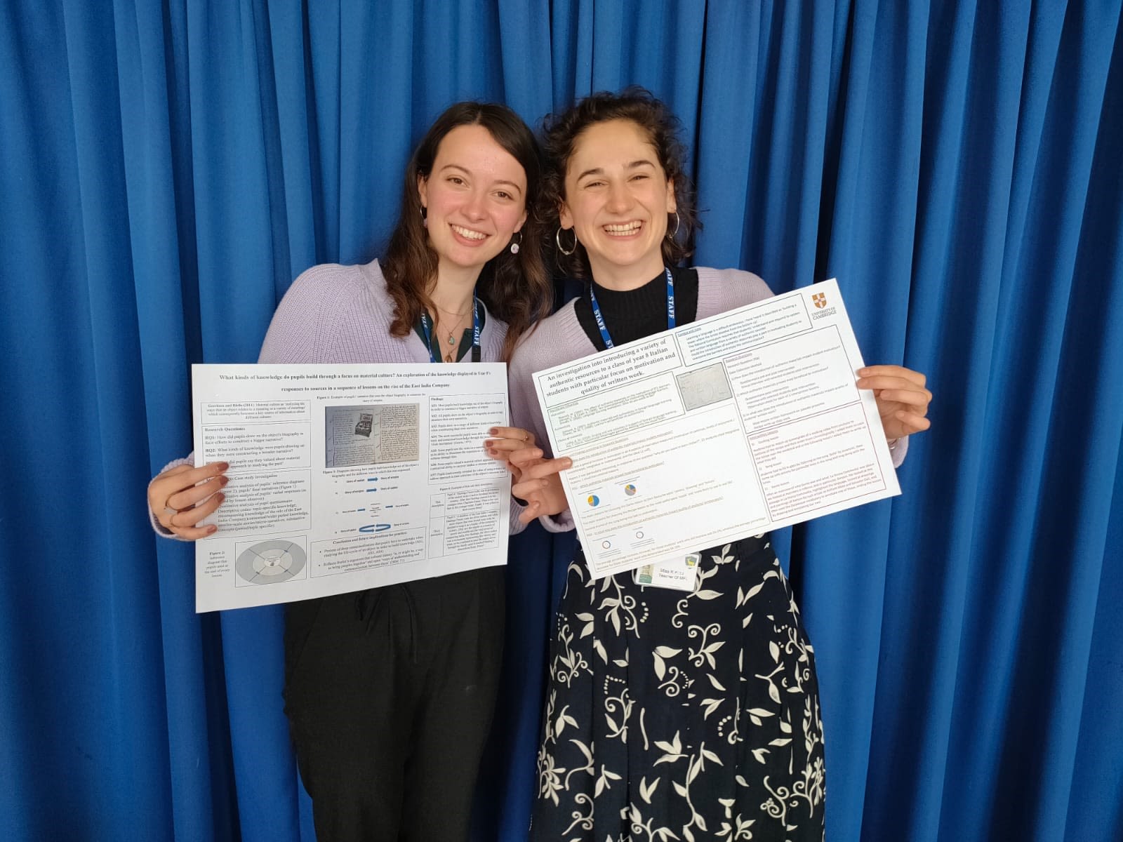 Proudly showing off presentation posters from 1c projects - the action research trainees undertake as part of their PGCE programme